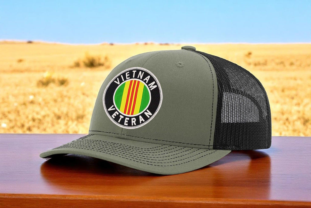 Vietnam Veteran Oval — Vietnam Veteran Oval Logo - Army Green and Black - Standard Bill Embroidered Trucker Hat — existing lifestyle 1