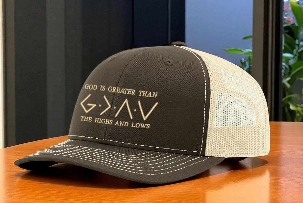 God Is Greater Than the Highs and Lows — God is Greater - Chocolate and Birch - Standard Bill Embroidered Trucker Hat — existing lifestyle 1