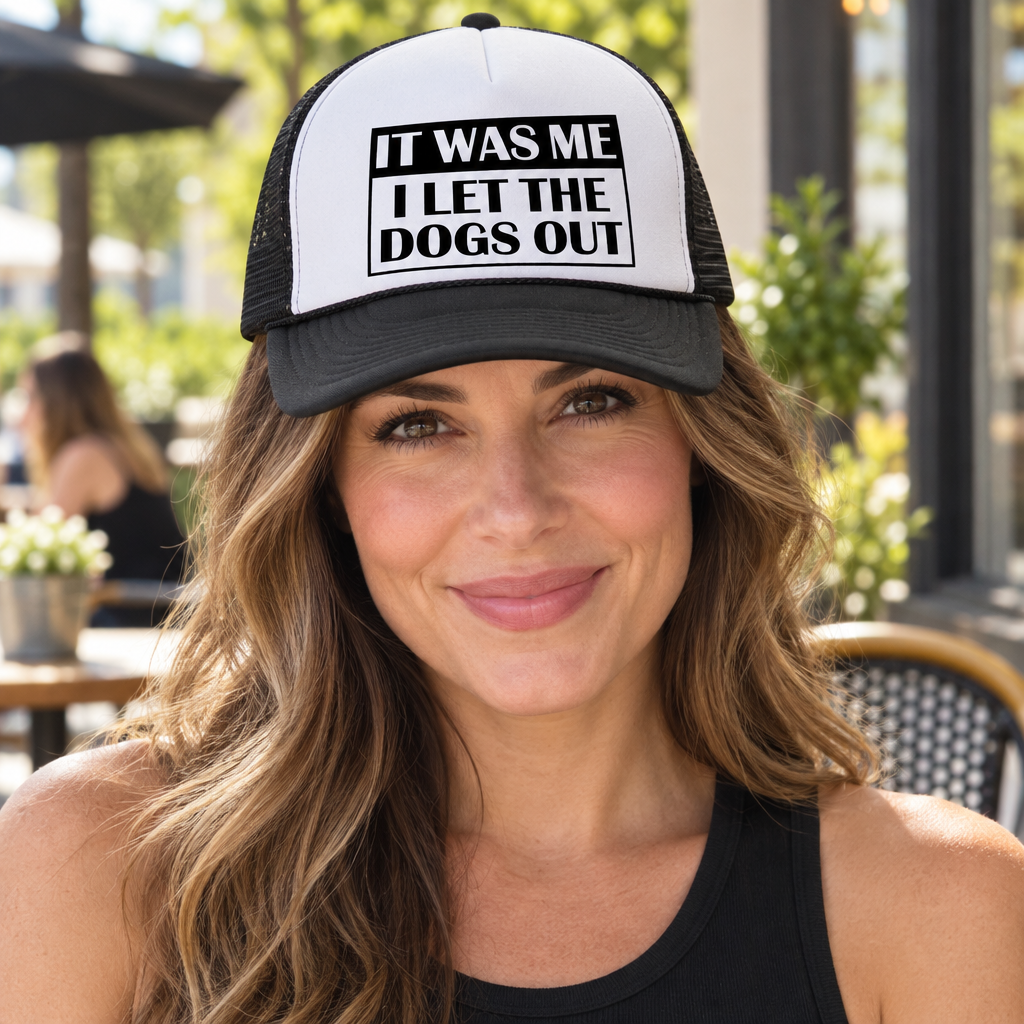I Let the Dogs Out — Black Trucker Hat — lifestyle hero